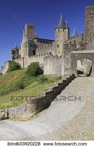 "Towers and entrance gate Port d'Aude of the medieval fortress of Carcassonne, Chateau Comtal, Cite de Carcassonne, Carcassonne, Departement Aude, Languedoc-Roussillon, France, Europe" View Large Photo Image Stock Photo - "Towers and entrance gate Port d'Aude of the medieval fortress of Carcassonne, Chateau Comtal, Cite de Carcassonne, Carcassonne, Departement Aude, Languedoc-Roussillon, France, Europe". Fotosearch