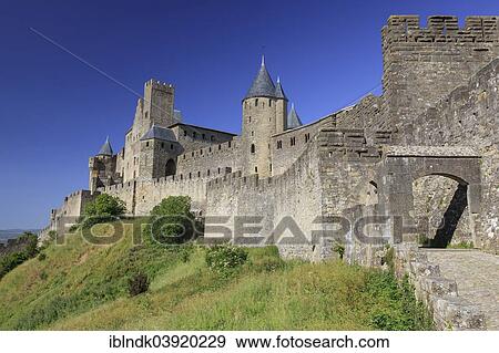 "Towers and entrance gate Port d'Aude of the medieval fortress of Carcassonne, Chateau Comtal, Cite de Carcassonne, Carcassonne, Departement Aude, Languedoc-Roussillon, France, Europe" View Large Photo Image Stock Photo - "Towers and entrance gate Port d'Aude of the medieval fortress of Carcassonne, Chateau Comtal, Cite de Carcassonne, Carcassonne, Departement Aude, Languedoc-Roussillon, France, Europe". Fotosearch