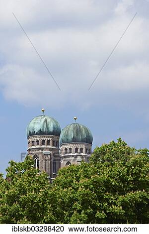 "Towers of Frauenkirche or Cathedral of Our Dear Lady with blossoming chestnut trees, city centre, Munich, Upper Bavaria, Bavaria, Germany, Europe" View Large Photo Image Stock Image - "Towers of Frauenkirche or Cathedral of Our Dear Lady with blossoming chestnut trees, city centre, Munich, Upper Bavaria, Bavaria, Germany, Europe". Fotosearch