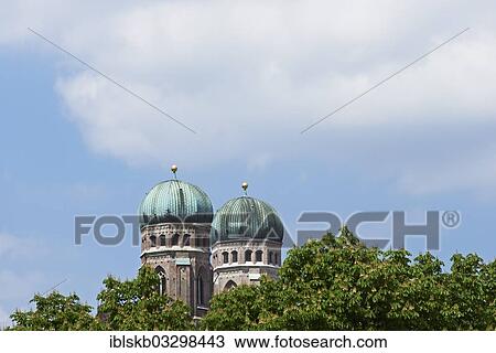 "Towers of Frauenkirche or Cathedral of Our Dear Lady with blossoming chestnut trees, city centre, Munich, Upper Bavaria, Bavaria, Germany, Europe" View Large Photo Image Stock Image - "Towers of Frauenkirche or Cathedral of Our Dear Lady with blossoming chestnut trees, city centre, Munich, Upper Bavaria, Bavaria, Germany, Europe". Fotosearch