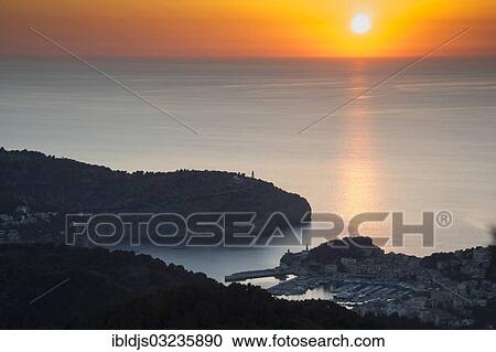 Stock Image - "Town by the sea, at sunset, Port de Soller, Majorca, Balearic Islands, Spain, Europe". Fotosearch