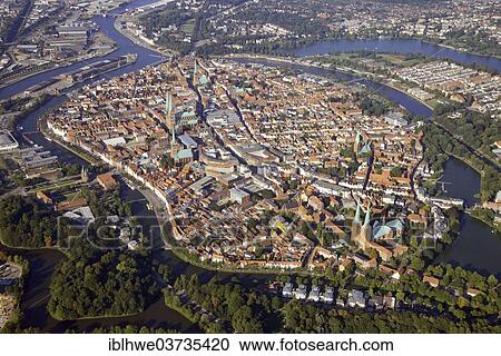 "Town centre of Luebeck, surrounded by the Trave River, aerial view, Lubeck, Schleswig-Holstein, Germany, Europe" View Large Photo Image Stock Image - "Town centre of Luebeck, surrounded by the Trave River, aerial view, Lubeck, Schleswig-Holstein, Germany, Europe". Fotosearch