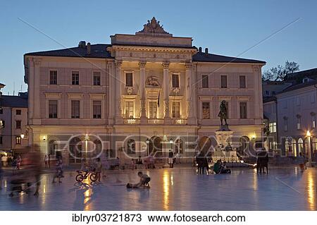 Stock Image - "Town Hall, Tartini Square at dusk, historic center, Piran, Coastalâ€“Karst Statistical Region, Slovenia, Europe". Fotosearch