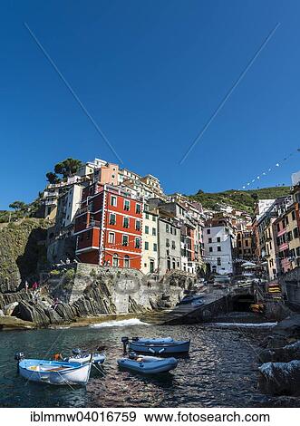 Stock Photo - "Town view with harbor and colorful houses, Riomaggiore, Cinque Terre, La Spezia, Liguria, Italy, Europe". Fotosearch