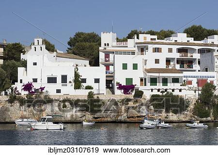 "Town with church, Portopetro, Mallorca, Majorca, Balearic Islands, Spain, Europe" View Large Photo Image Stock Photo - "Town with church, Portopetro, Mallorca, Majorca, Balearic Islands, Spain, Europe". Fotosearch