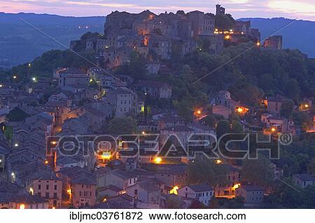 Stock Image - "Townscape at dusk, Cordes-sur-Ciel, Departement Tarn, Midi-Pyrenees, France, Europe". Fotosearch