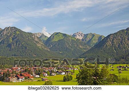 Stock Photography - "Townscape, behind the Loretto meadows and the Birgsautal, Oberstdorf, Allgaeu, Bavaria, Germany, Europe". Fotosearch