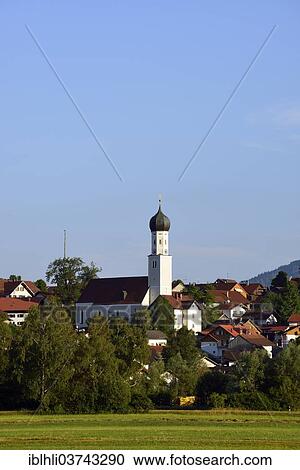Stock Image - "Townscape of Koenigsdorf with the Church of St. Lawrence, Konigsdorf, Upper Bavaria, Bavaria, Germany, Europe". Fotosearch