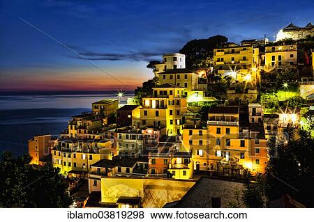 "Townscape of Riomaggiore at sunset, Unesco World Heritage Site, Cinque Terre, Italy, Europe" View Large Photo Image Stock Photo - "Townscape of Riomaggiore at sunset, Unesco World Heritage Site, Cinque Terre, Italy, Europe". Fotosearch