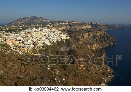 Stock Image - "Townscape of Thira, in the evening light, Santorini, Cyclades, Greece, Europe". Fotosearch