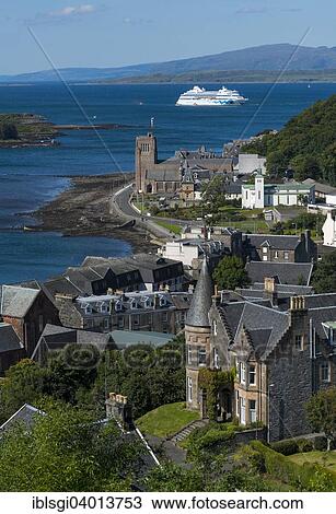 "Townscape, port and cruise ship AIDAcara at anchor, Oban, Scotland, United Kingdom, Europe" View Large Photo Image Stock Image - "Townscape, port and cruise ship AIDAcara at anchor, Oban, Scotland, United Kingdom, Europe". Fotosearch