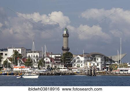 "Townscape with a lighthouse, Warnemunde, Rostock, Mecklenburg-Vorpommern, Germany, Europe" View Large Photo Image Stock Photograph - "Townscape with a lighthouse, Warnemunde, Rostock, Mecklenburg-Vorpommern, Germany, Europe". Fotosearch