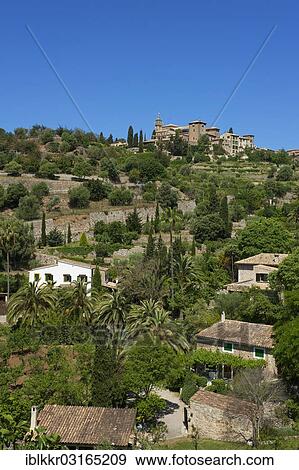 "Townscape with the Charterhouse or Royal Carthusian Monastery of Valldemossa, Valldemossa, Majorca, Balearic Islands, Spain, Europe" View Large Photo Image Stock Photo - "Townscape with the Charterhouse or Royal Carthusian Monastery of Valldemossa, Valldemossa, Majorca, Balearic Islands, Spain, Europe". Fotosearch