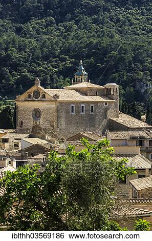 Stock Photograph - "Townscape with the Charterhouse or the Royal Carthusian Monastery of Valldemossa, Valldemossa, Balearische Inseln, Spain, Europe". Fotosearch