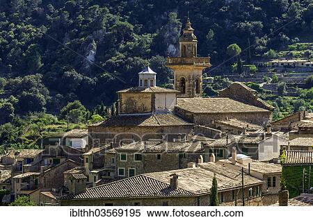 Stock Photography - "Townscape with the Church of San Bartolome, Valldemossa, Balearische Inseln, Spain, Europe". Fotosearch