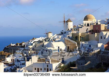 Stock Photo - "Townscape with windmills, Oia, Santorini, Cyclades, Greece, Europe". Fotosearch