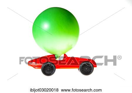 "Toy car with a """"balloon-drive"""", the air escaping from the balloon propels the car forward, symbolic image for alternative energies, technologies" View Large Photo Image Stock Photo - "Toy car with a """"balloon-drive"""", the air escaping from the balloon propels the car forward, symbolic image for alternative energies, technologies". Fotosearch