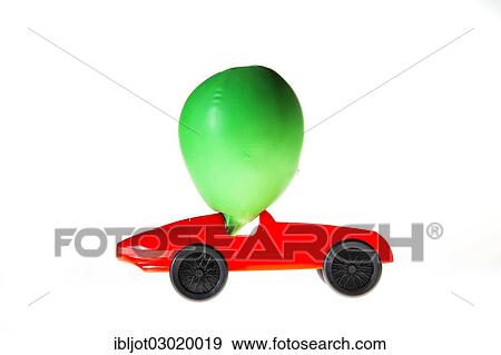 "Toy car with a """"balloon-drive"""", the air escaping from the balloon propels the car forward, symbolic image for alternative energies, technologies" View Large Photo Image Stock Photo - "Toy car with a """"balloon-drive"""", the air escaping from the balloon propels the car forward, symbolic image for alternative energies, technologies". Fotosearch