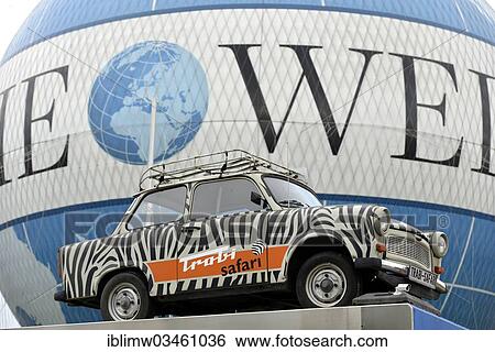 Stock Photograph - "Trabant car advertising sightseeing tours by Trabi, in front of the HiFlyer, Berlin, Berlin, Germany, Europe". Fotosearch