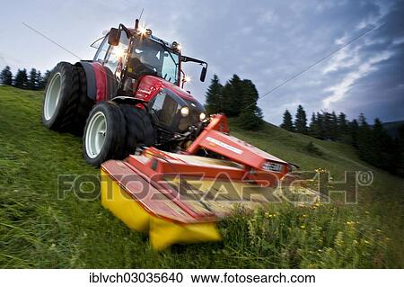 "Tractor mowing hay, Soll, Kufstein District, North Tirol, Tirol, Austria, Europe" View Large Photo Image Stock Image - "Tractor mowing hay, Soll, Kufstein District, North Tirol, Tirol, Austria, Europe". Fotosearch