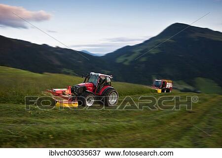 "Tractor mowing hay, Soll, Kufstein District, North Tirol, Tirol, Austria, Europe" View Large Photo Image Stock Photo - "Tractor mowing hay, Soll, Kufstein District, North Tirol, Tirol, Austria, Europe". Fotosearch