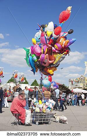 "Trader selling balloons, Cannstatter Wasen, Stuttgart Beer Festival, spring festival, fairground, Stuttgart, Baden-Wuerttemberg, Germany, Europe" View Large Photo Image Stock Photography - "Trader selling balloons, Cannstatter Wasen, Stuttgart Beer Festival, spring festival, fairground, Stuttgart, Baden-Wuerttemberg, Germany, Europe". Fotosearch