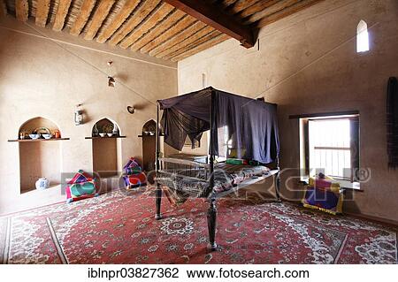 "Traditional bedroom, Nakhl Fort or Husn Al Heem, fortress, historic mudbrick building, Al-Batinah province, Sultanate of Oman, Arabian Peninsula" View Large Photo Image Stock Image - "Traditional bedroom, Nakhl Fort or Husn Al Heem, fortress, historic mudbrick building, Al-Batinah province, Sultanate of Oman, Arabian Peninsula". Fotosearch