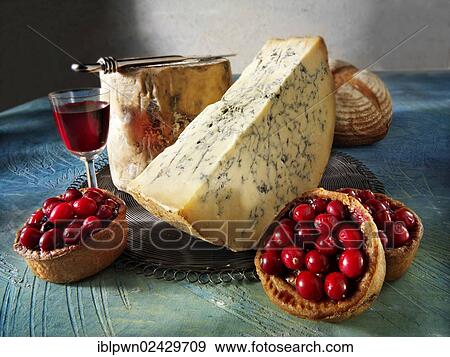 Traditional blue Stilton cheese with cranberry pork pie View Large Photo Image Stock Photo - Traditional blue Stilton cheese with cranberry pork pie. Fotosearch