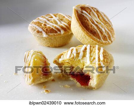 Stock Image - Traditional British bakewell tarts. Fotosearch