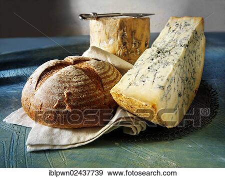 Traditional British blue Stilton cheese truckle View Large Photo Image Stock Photo - Traditional British blue Stilton cheese truckle. Fotosearch