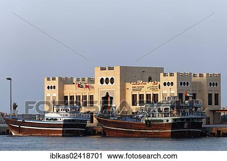 Traditional cargo ships, dhows or daus, in front of Shindagha Customs Station, Dubai, United Arab Emirates, Middle East, Asia View Large Photo Image Stock Image - Traditional cargo ships, dhows or daus, in front of Shindagha Customs Station, Dubai, United Arab Emirates, Middle East, Asia. Fotosearch