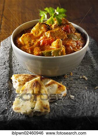 Stock Photograph - "Traditional Chicken Balti, Indian cuisine". Fotosearch