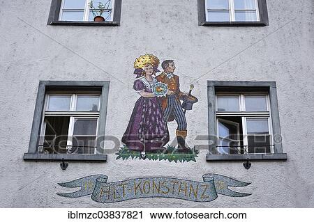 "Traditional costumed couple, designed as a mosaic, on facade, 1933, Konstanz, Baden-Wurttemberg, Germany, Europe" View Large Photo Image Stock Image - "Traditional costumed couple, designed as a mosaic, on facade, 1933, Konstanz, Baden-Wurttemberg, Germany, Europe". Fotosearch