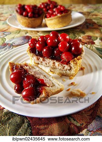Traditional Cranberry topped pork pies View Large Photo Image Stock Photography - Traditional Cranberry topped pork pies. Fotosearch