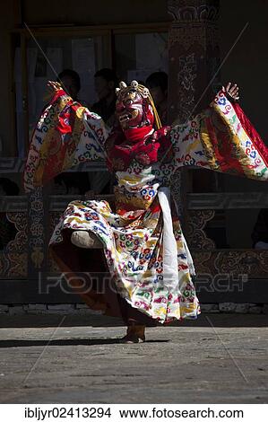 Picture - Traditional dancer at Tsechu festival, Trongsa, Bhutan, Asia. Fotosearch