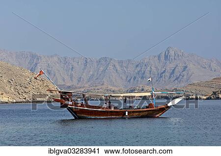 "Traditional dhow moored in a bay, Khor Ash Sham Fjord, Musandam Governorate, Oman, Asia" View Large Photo Image Stock Image - "Traditional dhow moored in a bay, Khor Ash Sham Fjord, Musandam Governorate, Oman, Asia". Fotosearch