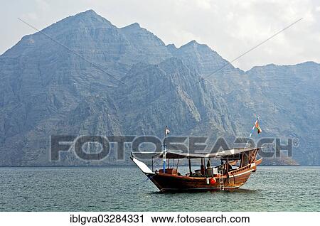 "Traditional dhow moored in a bay, Khor Ash Sham Fjord, Musandam Governorate, Oman, Asia" View Large Photo Image Stock Image - "Traditional dhow moored in a bay, Khor Ash Sham Fjord, Musandam Governorate, Oman, Asia". Fotosearch