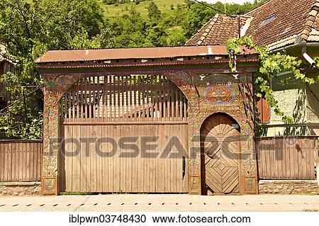"Traditional folk art painted and carved wooden Szekely gate, near Cluj Napoca, Romania, Europe" View Large Photo Image Stock Image - "Traditional folk art painted and carved wooden Szekely gate, near Cluj Napoca, Romania, Europe". Fotosearch
