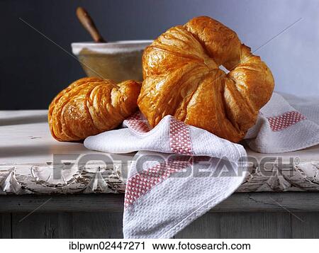 Stock Image - Traditional French butter croissants. Fotosearch