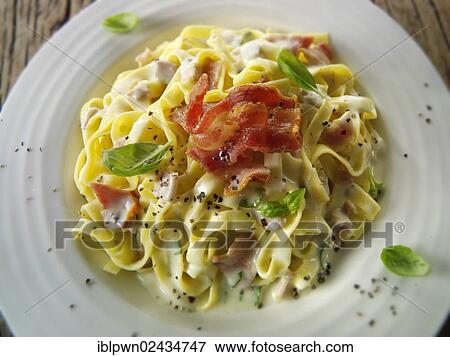 Traditional Italian Pasta Carbonara with Tagliatelle View Large Photo Image Stock Photo - Traditional Italian Pasta Carbonara with Tagliatelle. Fotosearch
