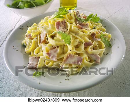 Stock Photo - Traditional Italian Tagliatelli Carbonara. Fotosearch