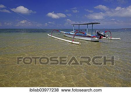 "Traditional outrigger boat on the beach, Sanur, Bali, Indonesia, Asia" View Large Photo Image Stock Photo - "Traditional outrigger boat on the beach, Sanur, Bali, Indonesia, Asia". Fotosearch