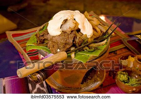 Stock Image - "Traditional parillada in the restaurant """"El fogon de Jovel"""", San Cristobal de las Casas, Chiapas, Mexico, North America". Fotosearch