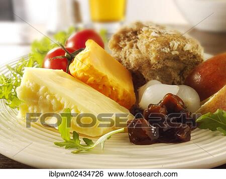 Stock Photograph - Traditional Ploughman's lunch with Cheddar and Lancashire cheese. Fotosearch
