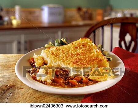 Traditional potato and minced beef cottage pie View Large Photo Image Stock Image - Traditional potato and minced beef cottage pie. Fotosearch