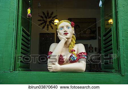 Stock Image - "Traditional puppet in a window, Sao Joao del Rei, Minas Gerais, Brazil, South America". Fotosearch