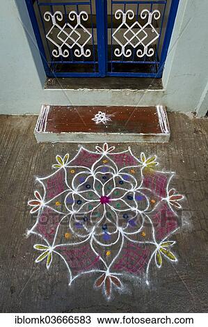 "Traditional Rangoli, Kolam or Muggu, decorative pattern made of coloured sand outside a door, Rameswaram, Pamban Island, Tamil Nadu, India, Asia" View Large Photo Image Stock Image - "Traditional Rangoli, Kolam or Muggu, decorative pattern made of coloured sand outside a door, Rameswaram, Pamban Island, Tamil Nadu, India, Asia". Fotosearch