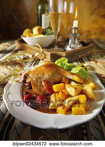 Stock Image - Traditional roast Gresham duck dinner. Fotosearch