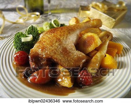 Stock Photograph - Traditional roast Gresham duck dinner. Fotosearch