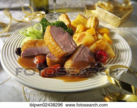 Traditional roast Gresham duck dinner View Large Photo Image Stock Photograph - Traditional roast Gresham duck dinner. Fotosearch